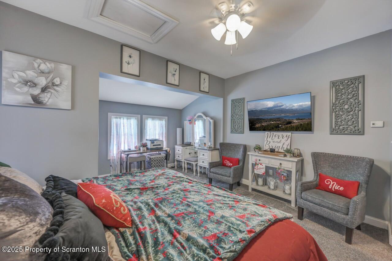 1531 Electric Street Dunmore, PA 18509 - Photo 30 of 56 a bedroom with furniture and a flat screen tv
