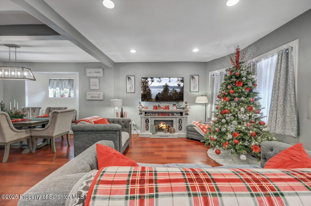 1531 Electric Street Dunmore, PA 18509 - Photo 6 of 56 a living room filled with furniture and a chandelier