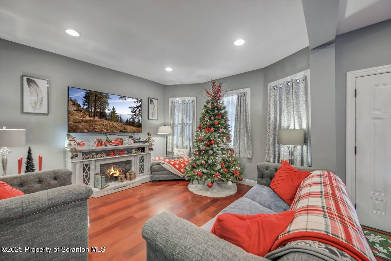 1531 Electric Street Dunmore, PA 18509 - Photo 7 of 56 a living room with furniture and a flat screen tv