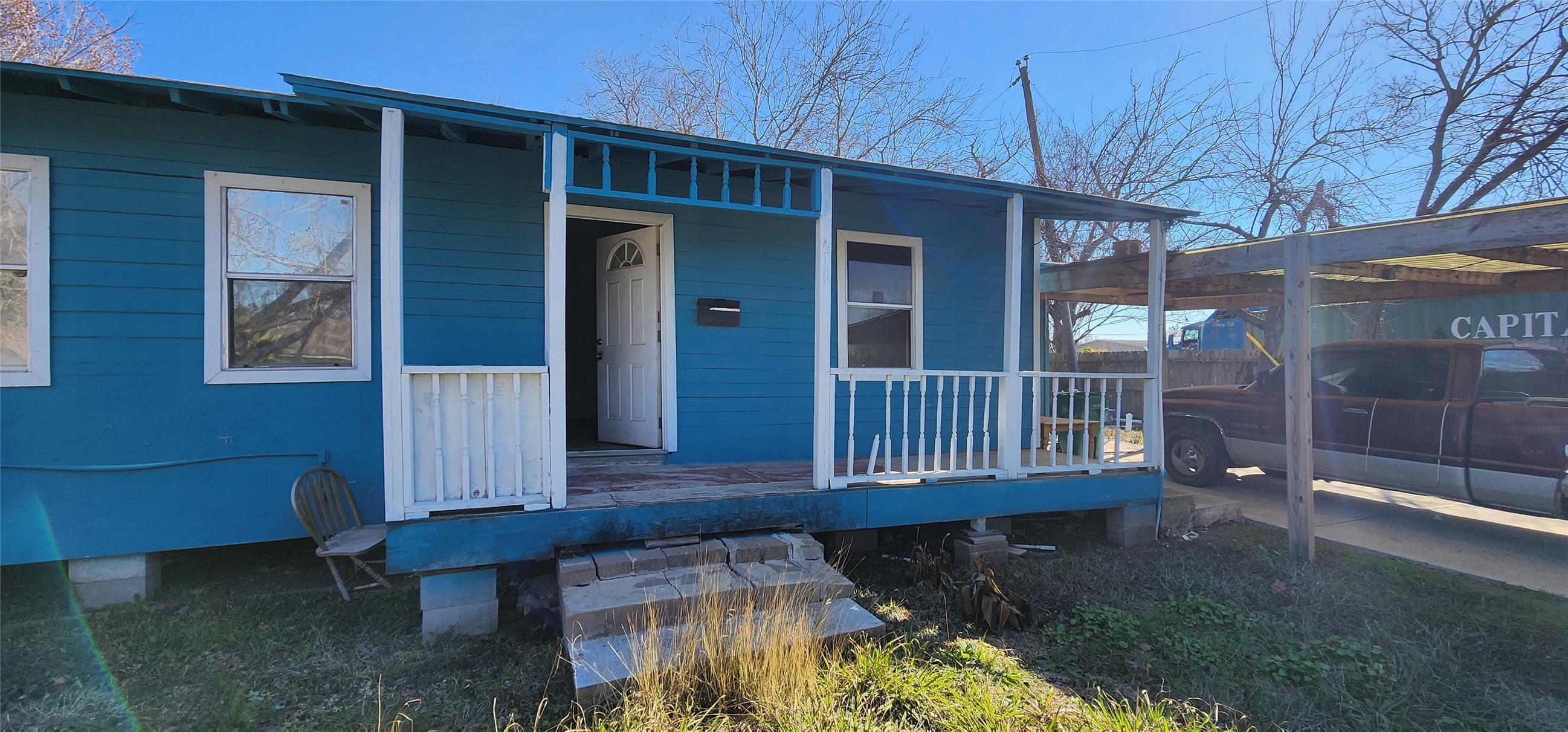 219 Witter Street Pasadena, TX 77506 - Photo 2 of 7 a view of a house with a small yard and wooden floor and fence