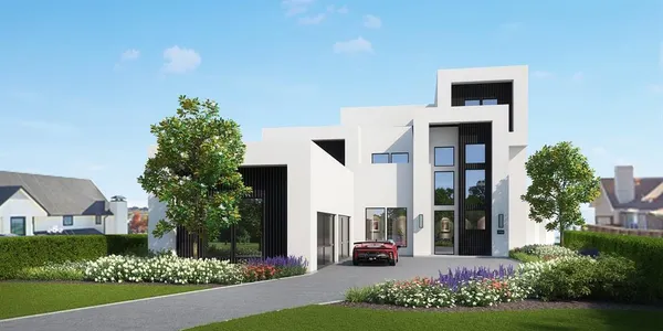 a front view of a house with garden