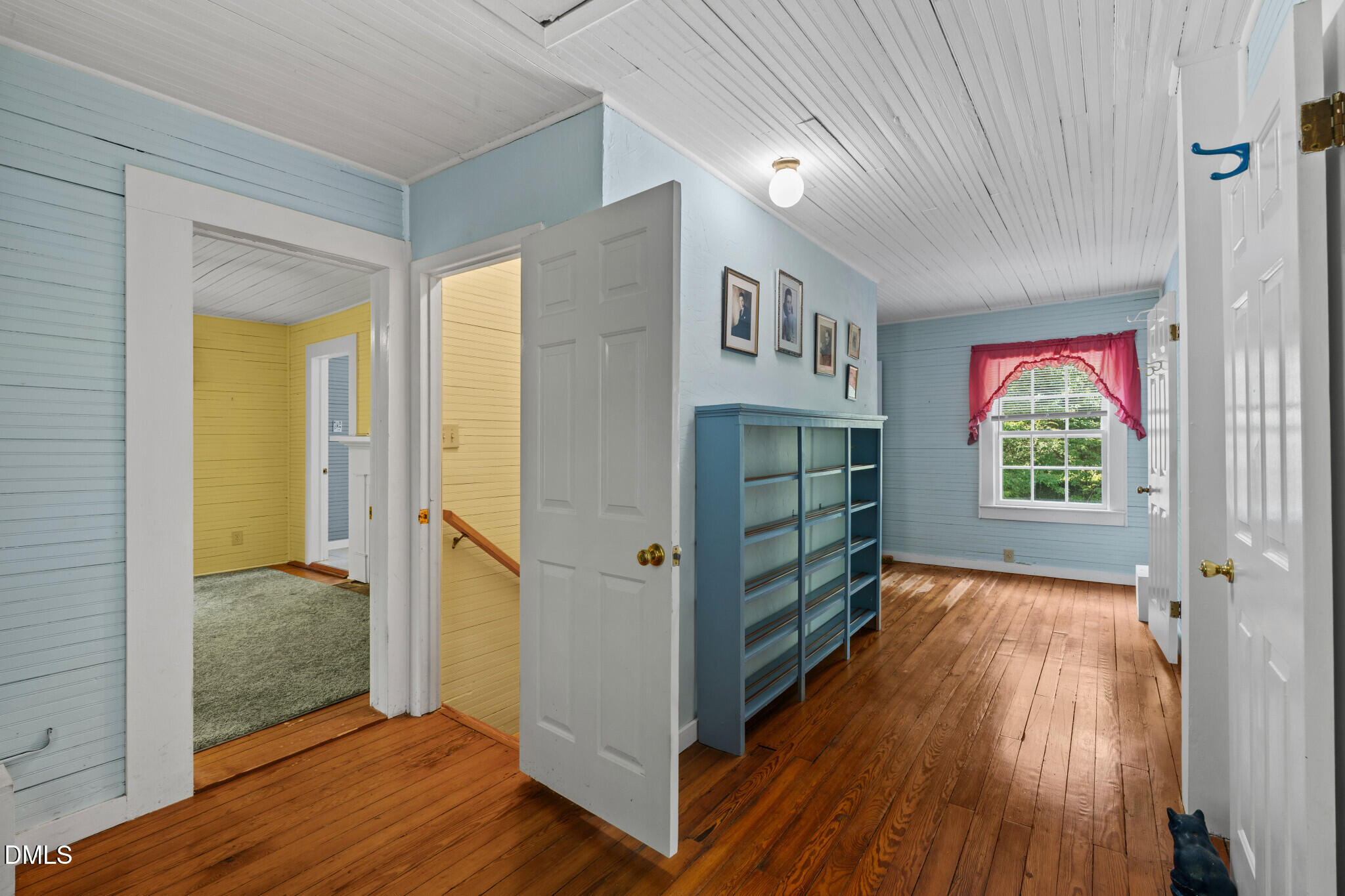 3415 Mt Willing Road Efland, NC 27243 - Photo 16 of 36 a view of hallway with wooden floor