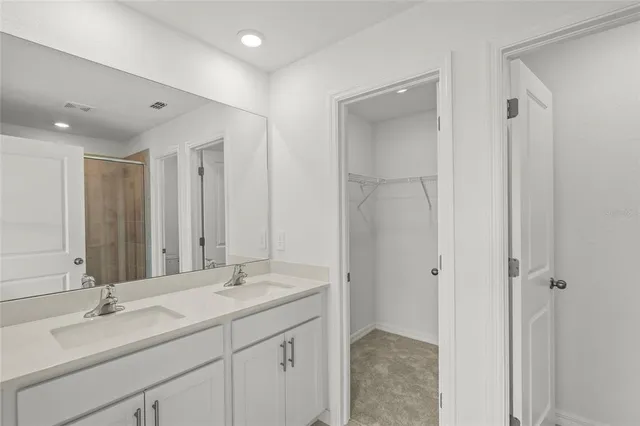 a bathroom with a shower and a toilet