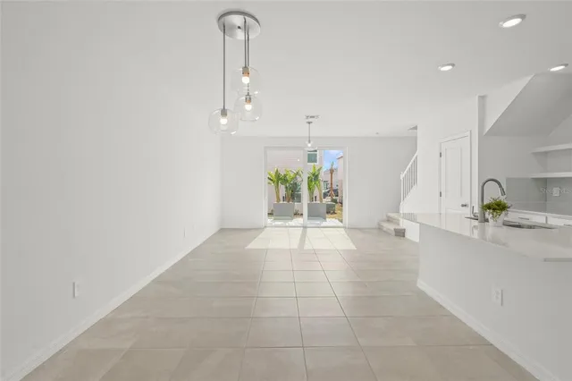 a view of a kitchen with a sink