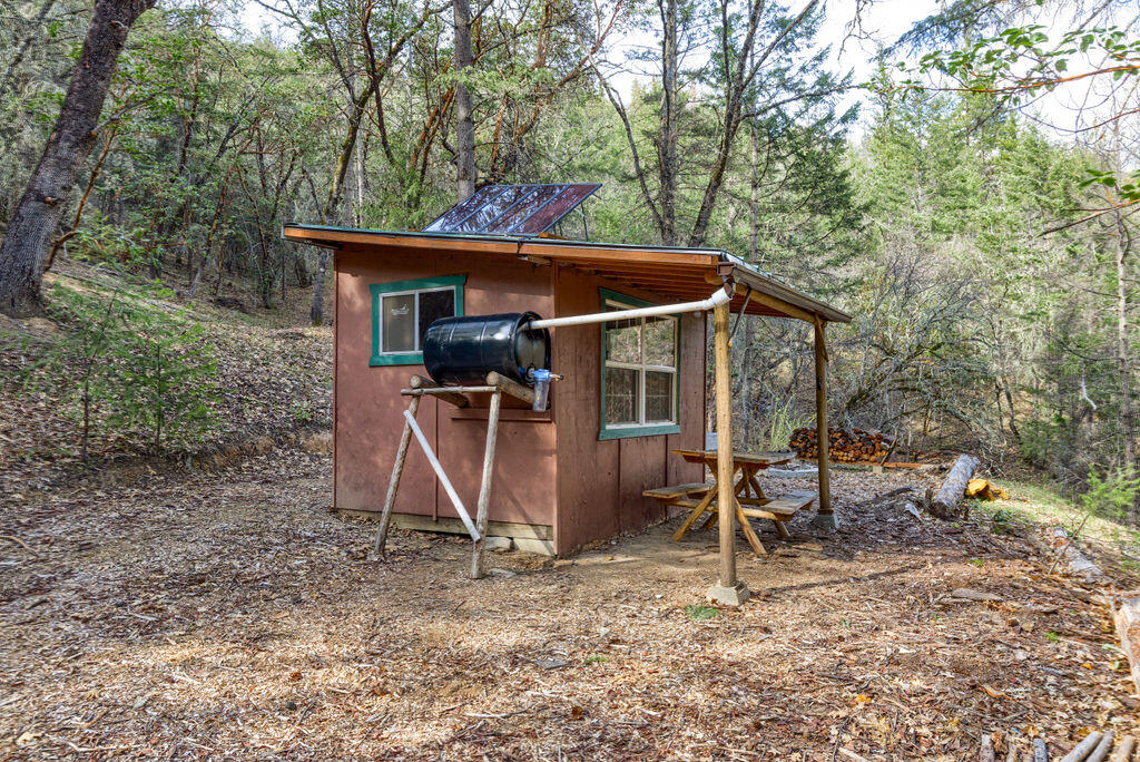 4766 Andrews Road Medford, OR 97501 - Photo 62 of 71 Refurbished hunters cabin with filtered rain water catch system and solar lighting