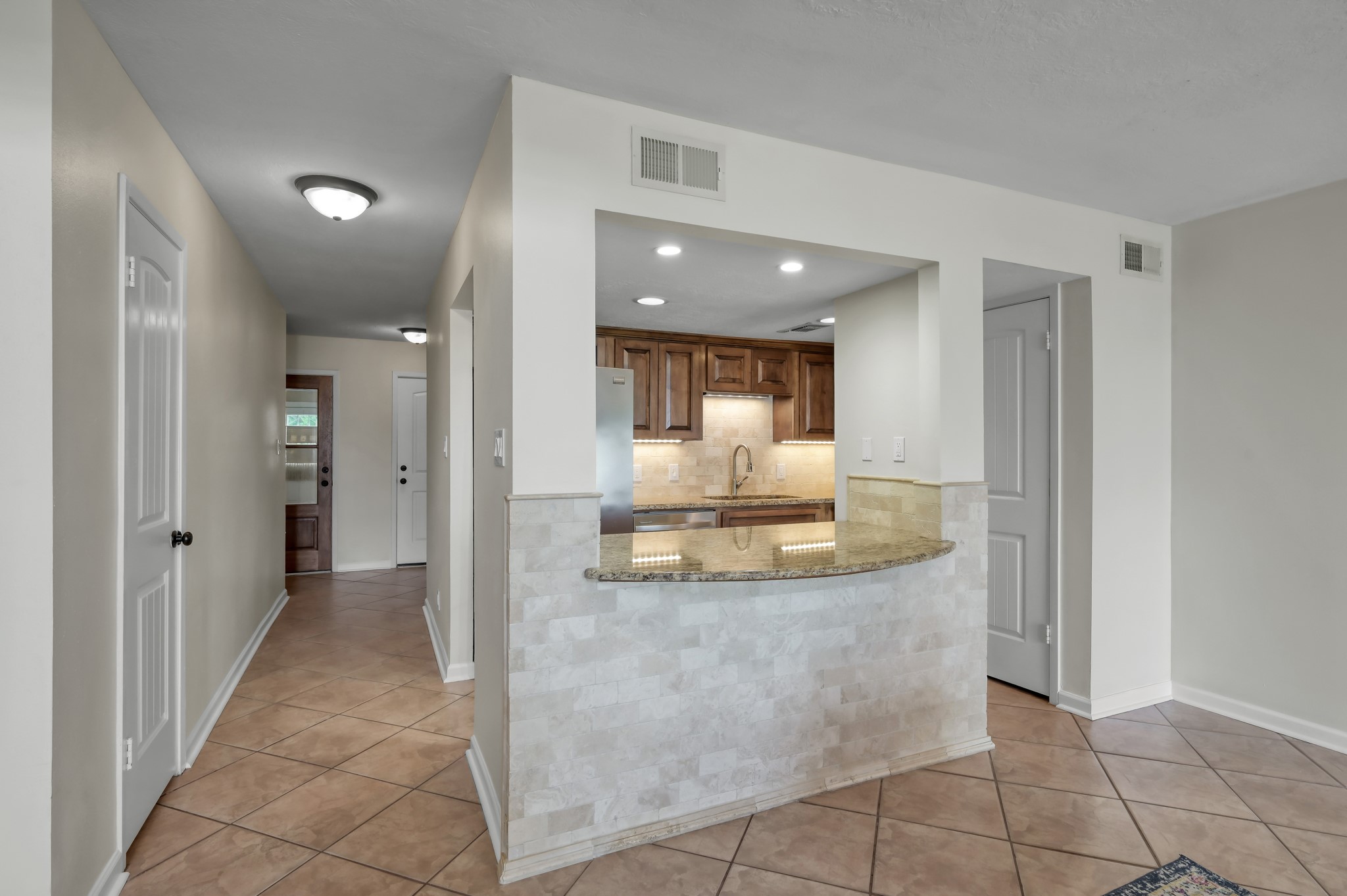 33 Regency Point Montgomery, TX 77356 - Photo 5 of 29 a view of a living room and kitchen