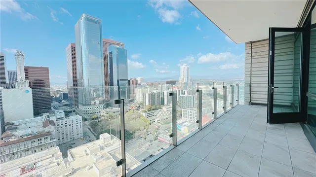 a view of a balcony with city view