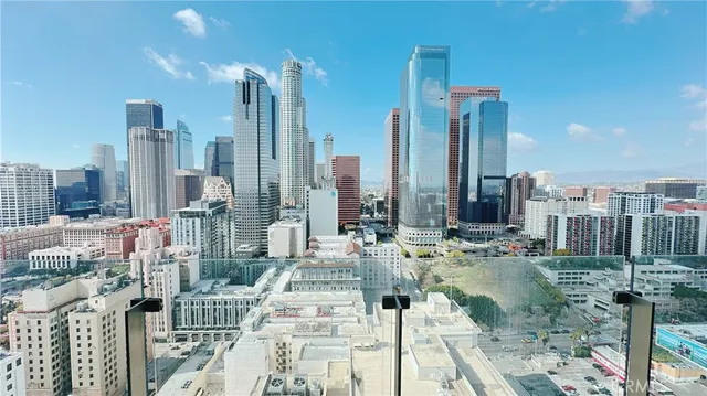 a view of city with tall buildings