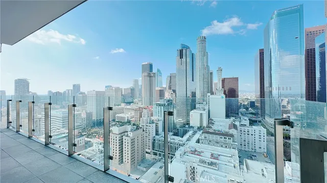 a view of city with tall buildings