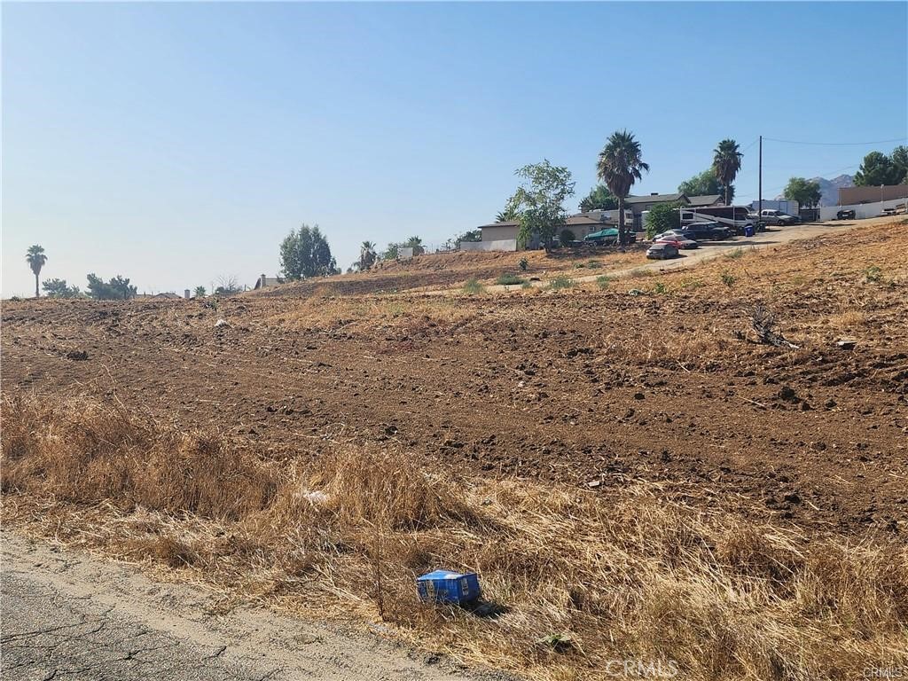 0 Jewel Street Jurupa Valley, CA 92509 - Photo 6 of 13 a view of a dry yard with wooden fence