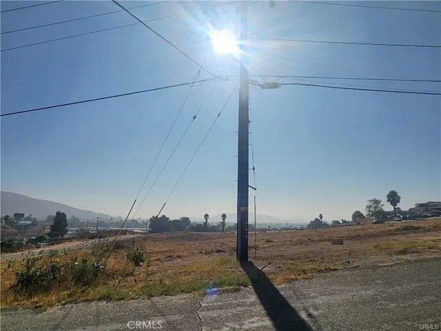 a view of an ocean with a mountain view