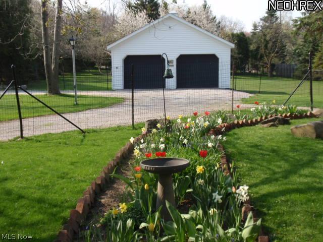 10809 Mitchells Mill Road Chardon, OH 44024 - Photo 16 of 16 Detached two car garage with view of beautifully landscaped gardens