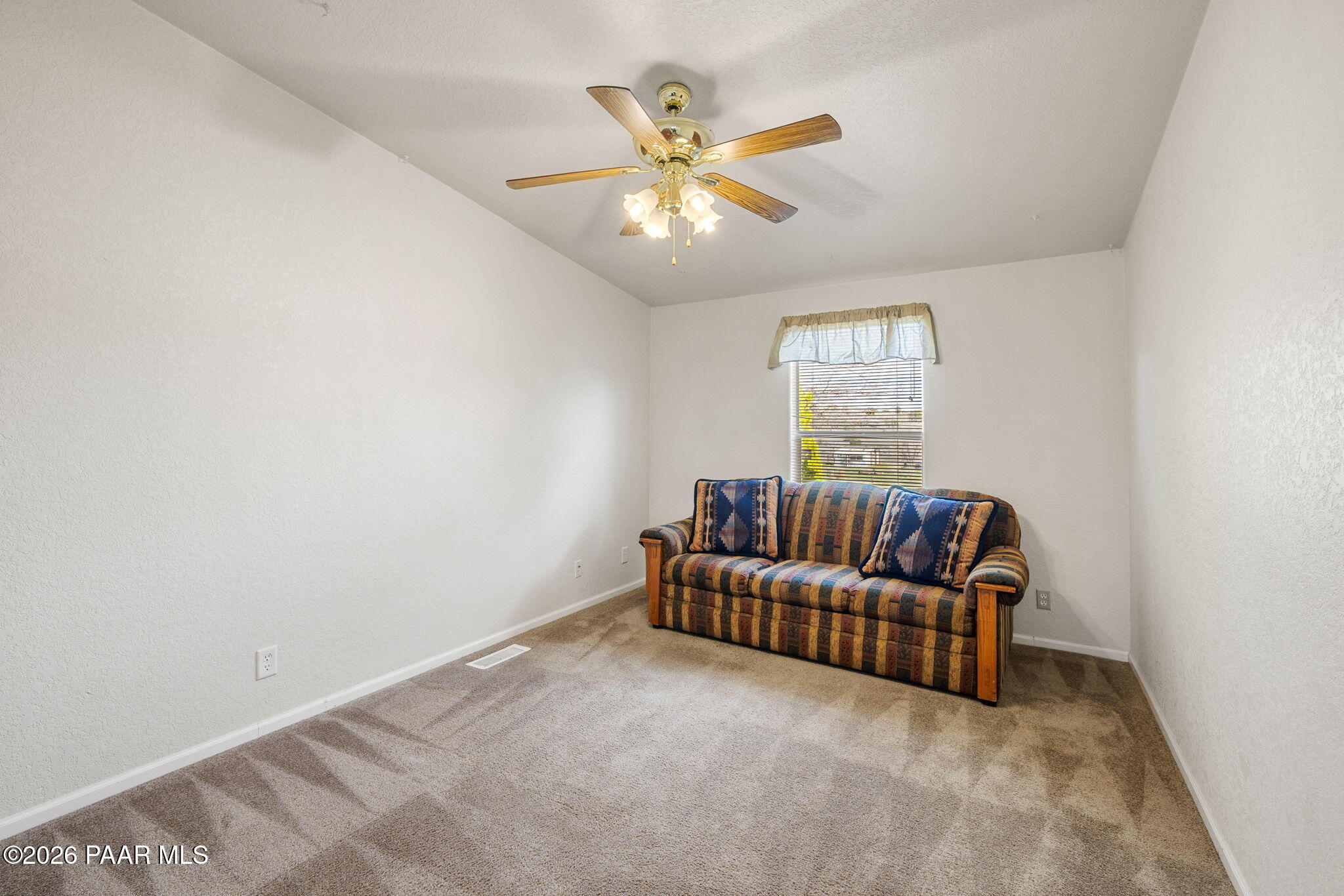 24680 North St Louis Street Paulden, AZ 86334 - Photo 12 of 33 a living room with furniture and a window