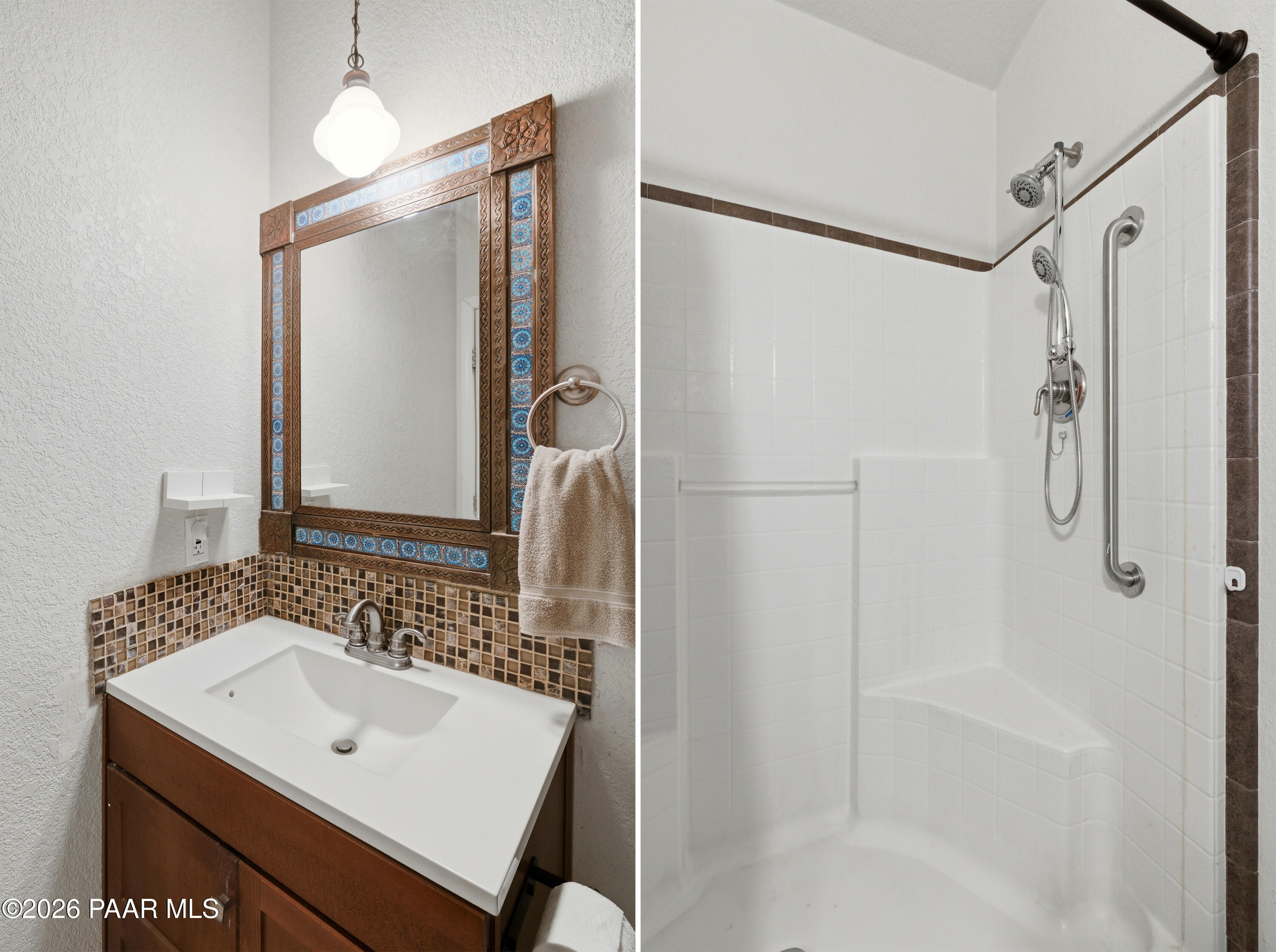 24680 North St Louis Street Paulden, AZ 86334 - Photo 14 of 33 a bathroom with a sink mirror and a shower
