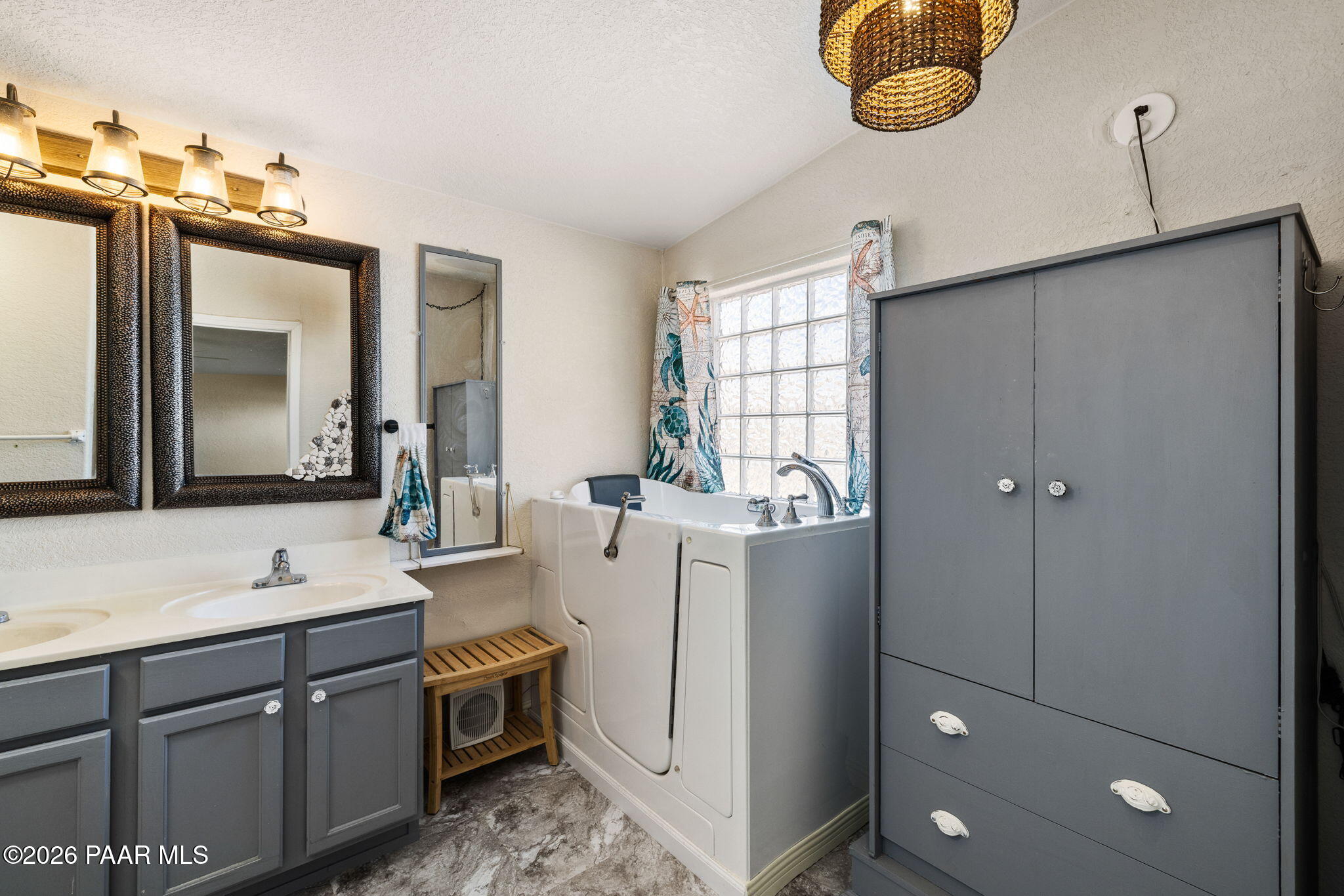 24680 North St Louis Street Paulden, AZ 86334 - Photo 21 of 33 a bathroom with a sink vanity and mirror