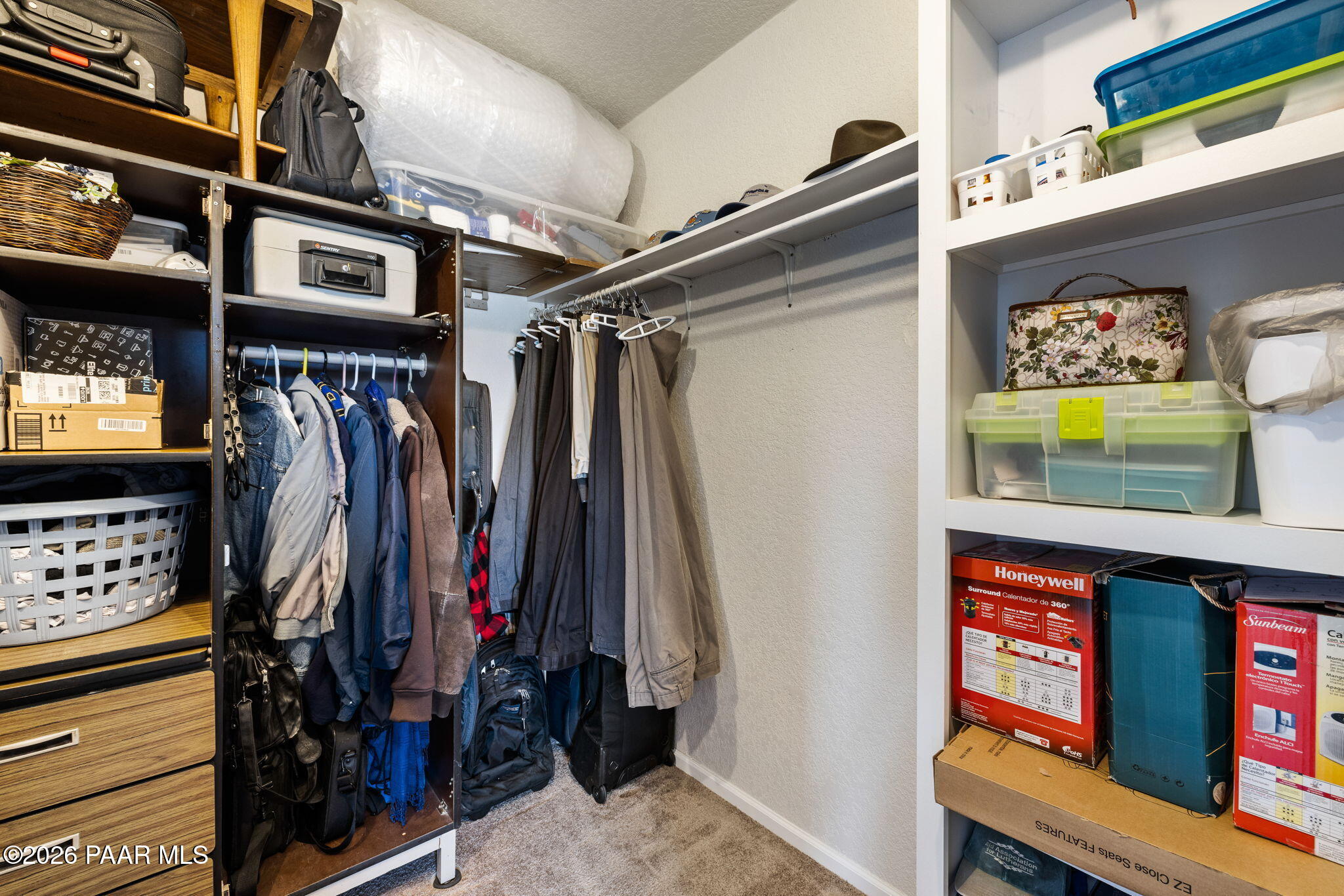 24680 North St Louis Street Paulden, AZ 86334 - Photo 23 of 33 a view of walk in closet with clothes