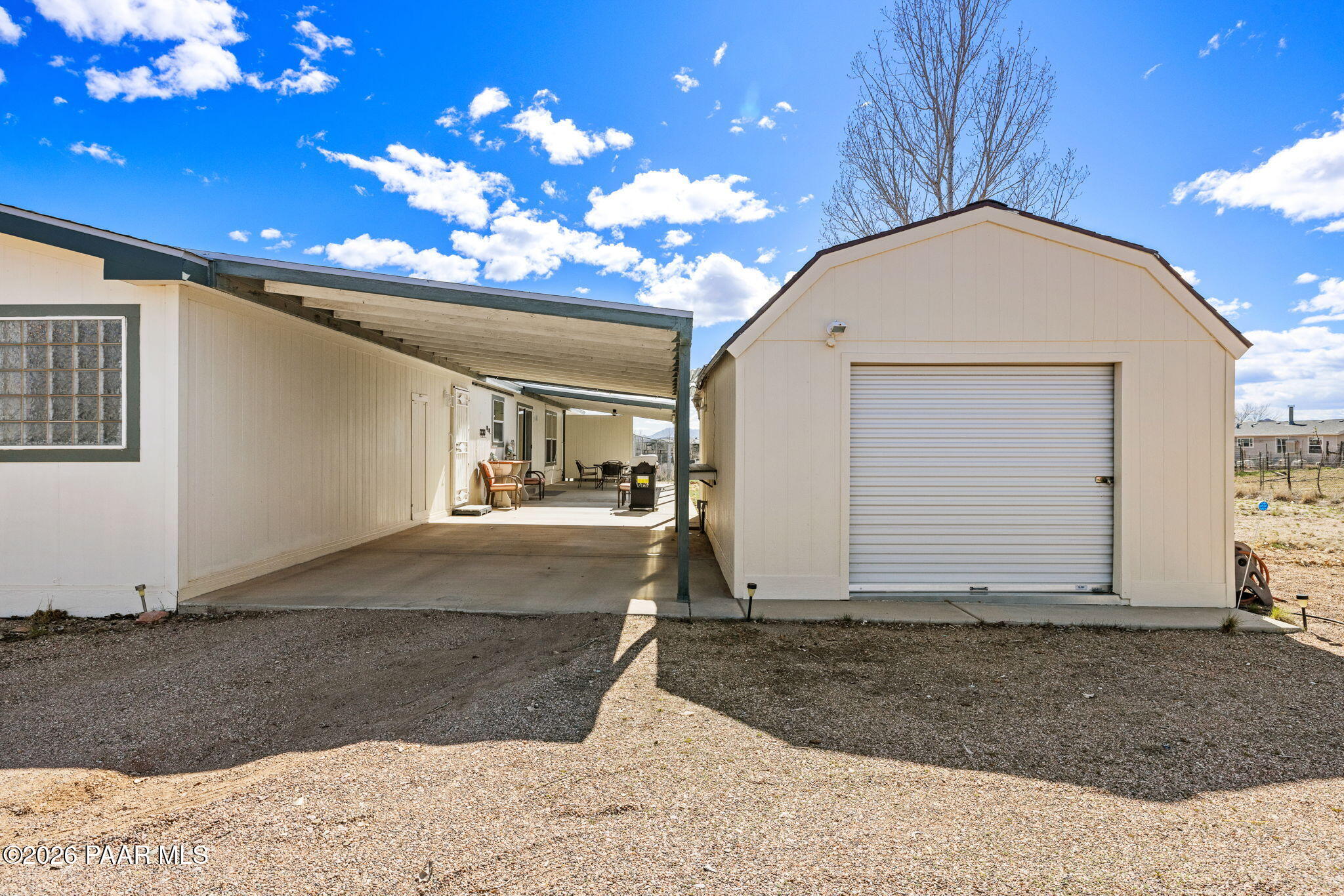 24680 North St Louis Street Paulden, AZ 86334 - Photo 26 of 33 a view of a house with a yard