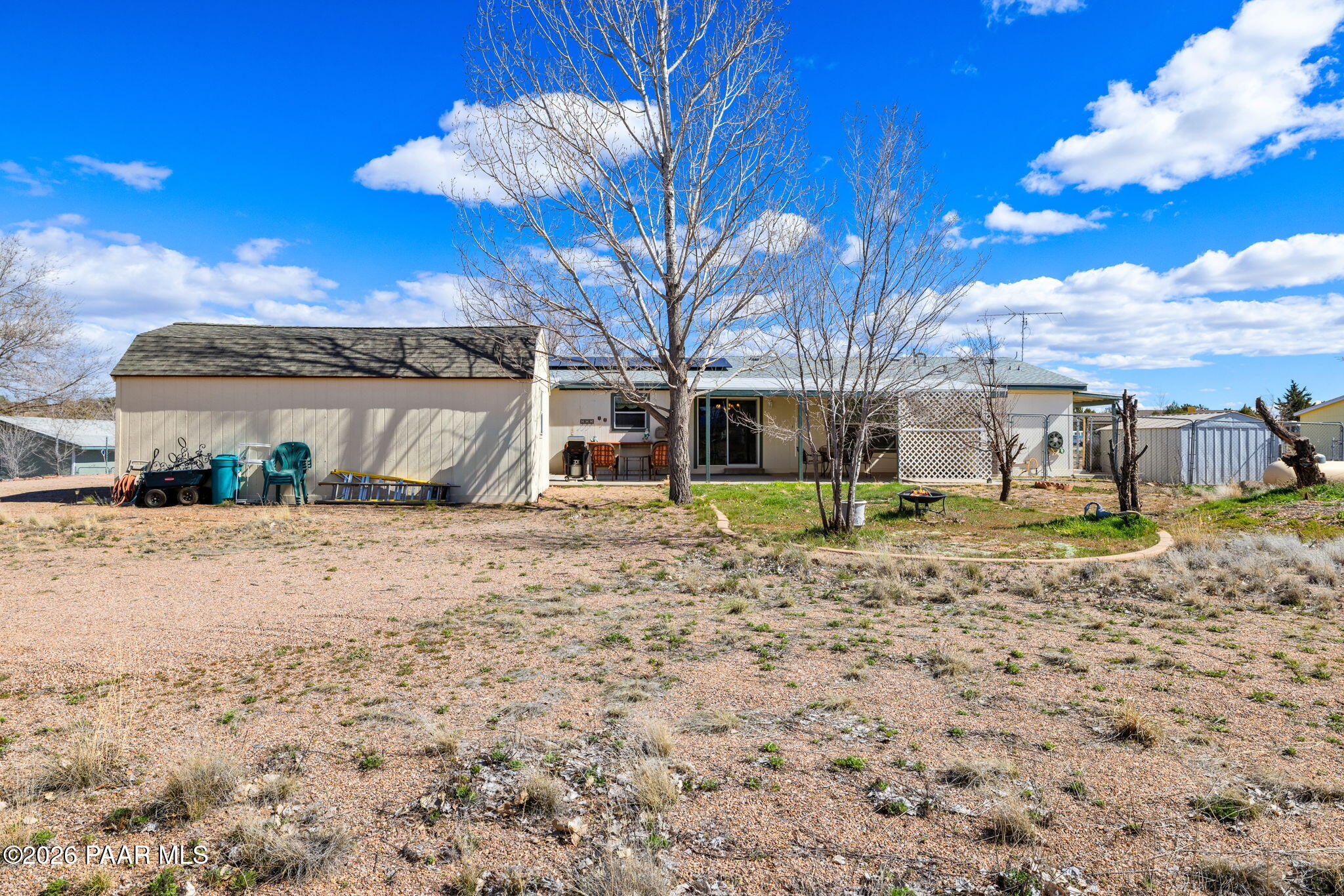 24680 North St Louis Street Paulden, AZ 86334 - Photo 27 of 33 a view of a house with a yard