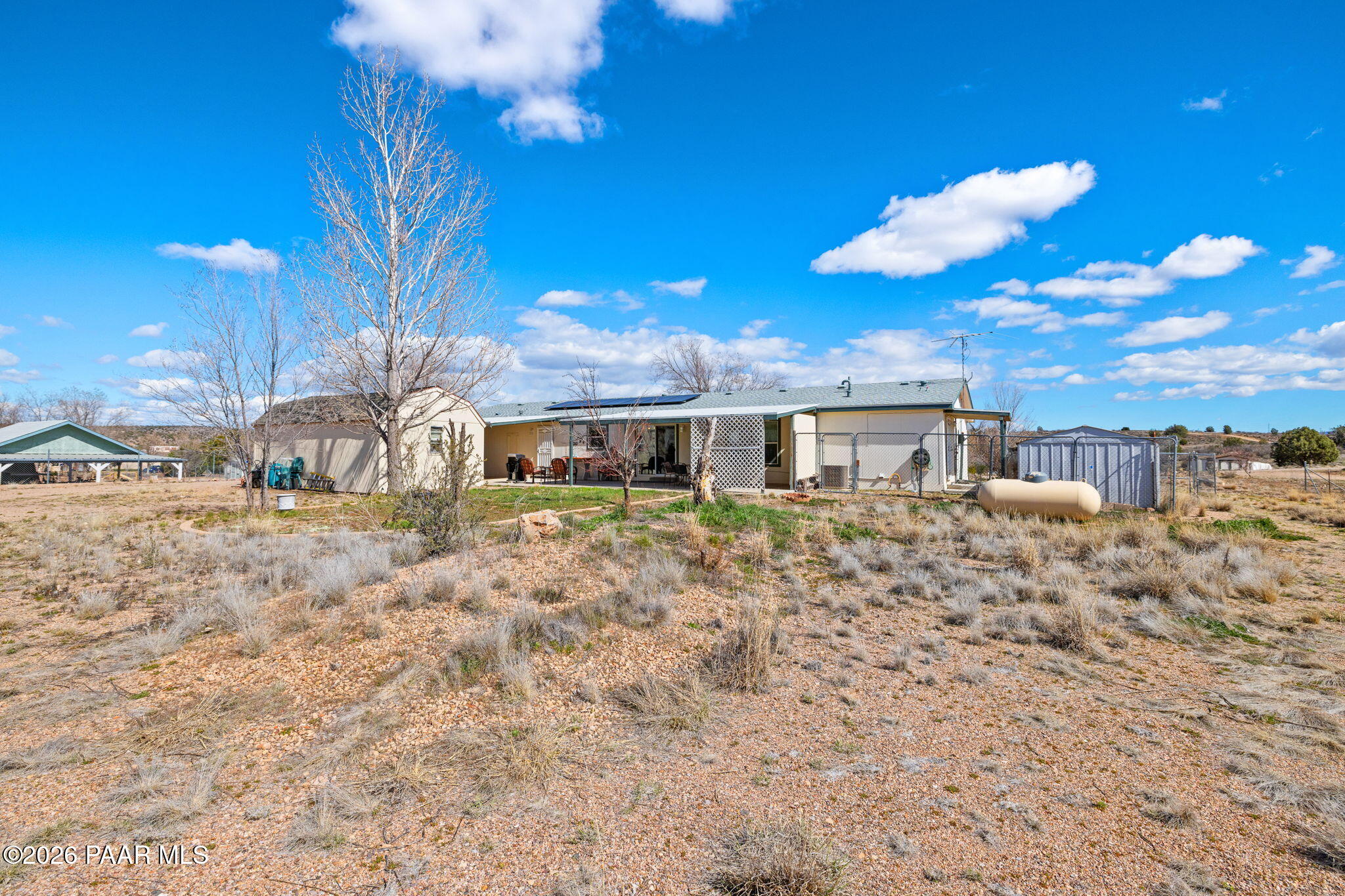 24680 North St Louis Street Paulden, AZ 86334 - Photo 28 of 33 a front view of a house with a yard