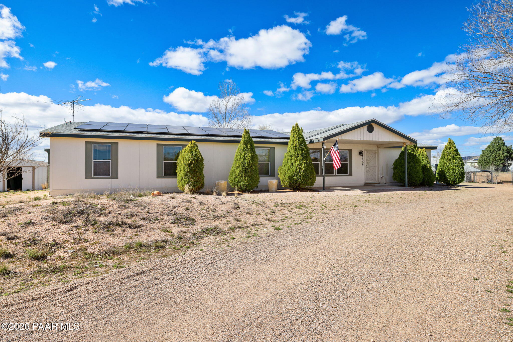 24680 North St Louis Street Paulden, AZ 86334 - Photo 33 of 33 a front view of a house with a yard