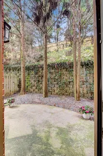 a view of a backyard of a house