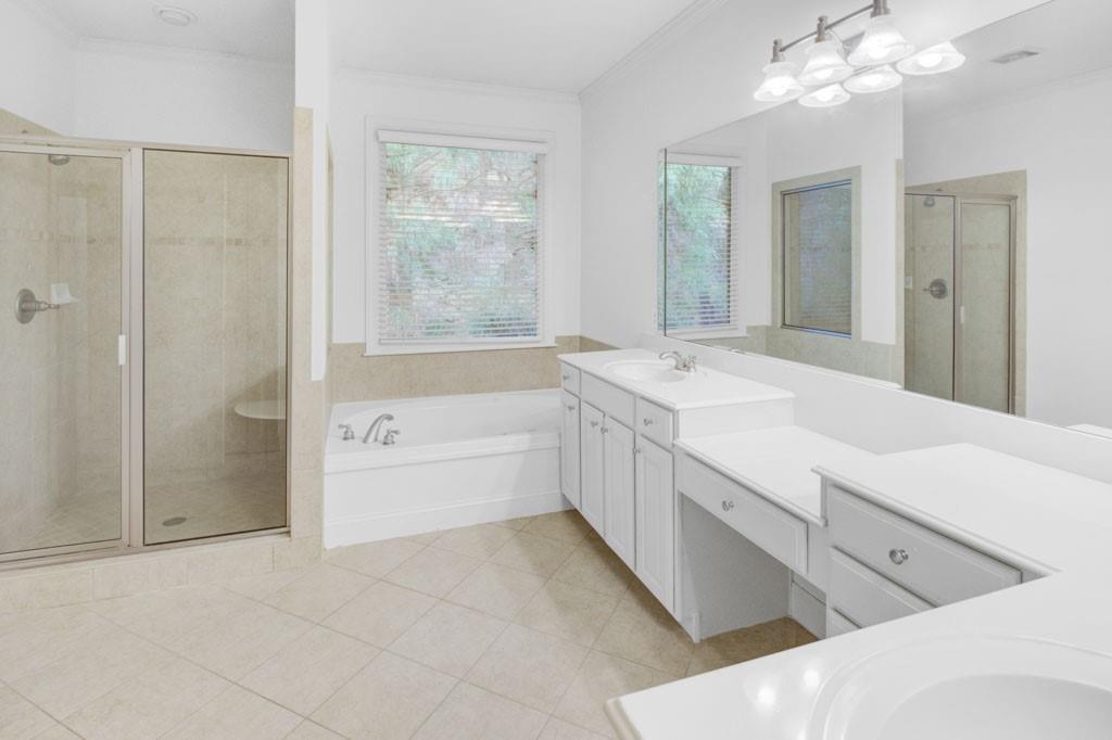 4428 Wilkerson Manor Drive, Unit 6 Smyrna, GA 30080 - Photo 20 of 27 a spacious bathroom with a tub sink shower and mirror