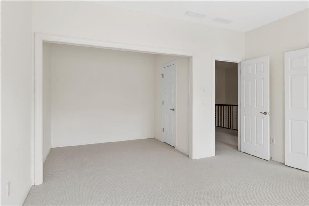 4428 Wilkerson Manor Drive, Unit 6 Smyrna, GA 30080 - Photo 25 of 27 a view of an empty room