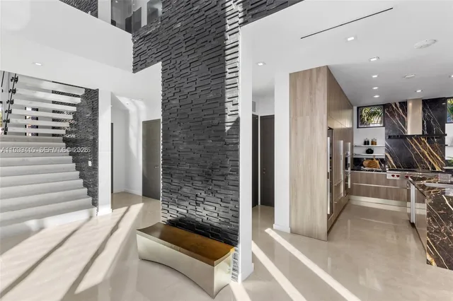 a bathroom with a tub and shower