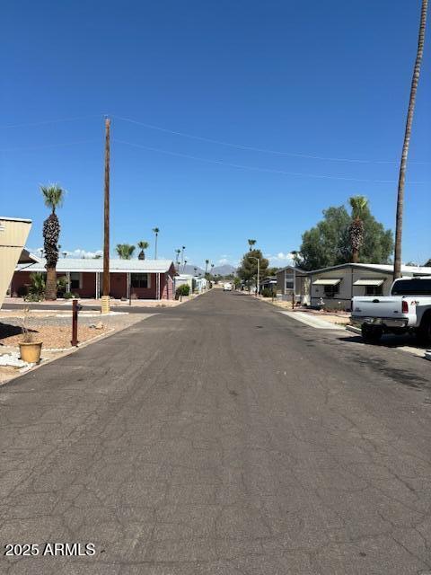 19225 North Cave Creek Road, Unit 83 Phoenix, AZ 85024 - Photo 9 of 10 a view of a street with cars