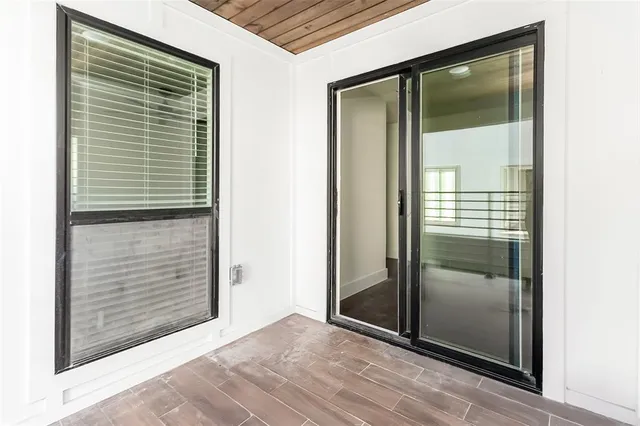 a view of entryway with wooden floor