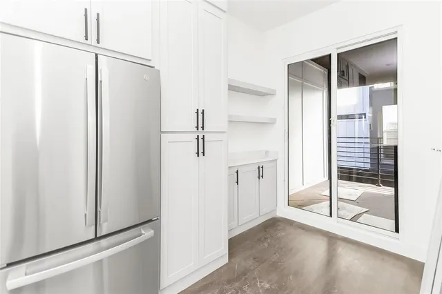 a view of a bathroom with a glass door