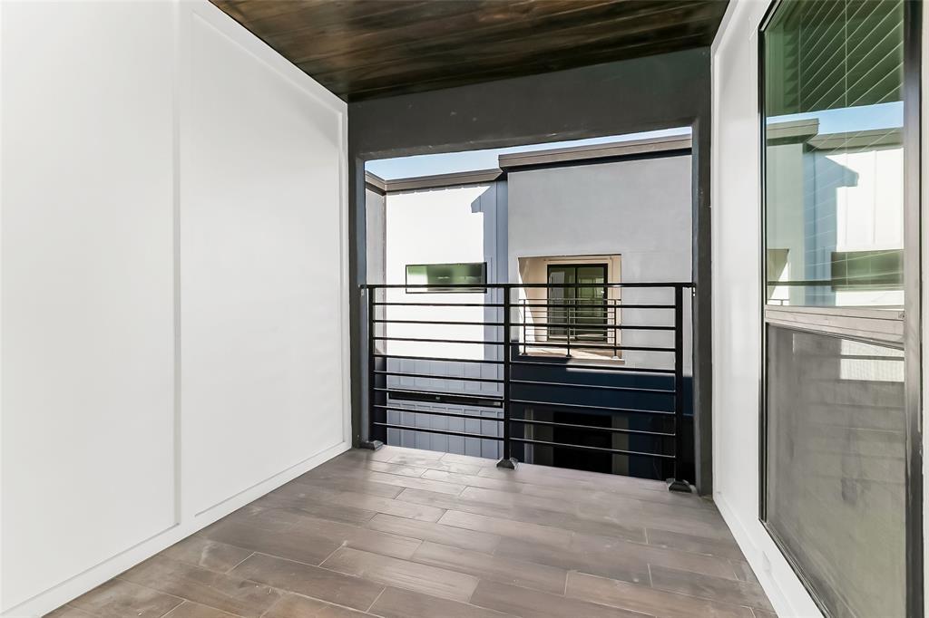 1101 Poindexter Street, Unit A2 Fort Worth, TX 76102 - Photo 9 of 40 a view of walk in closet with clothes and shoes