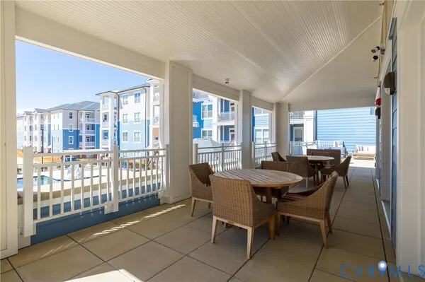 a view of pool with outdoor seating
