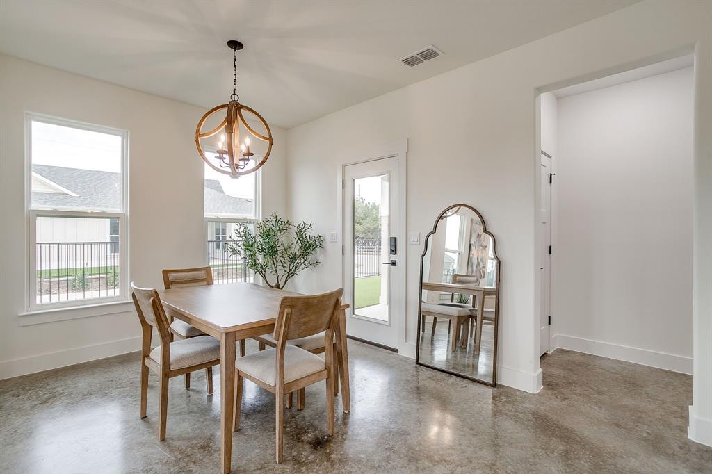 110 Cardinal Wds Granbury, TX 76049 - Photo 12 of 29 a view of a dining room with furniture window and wooden floor