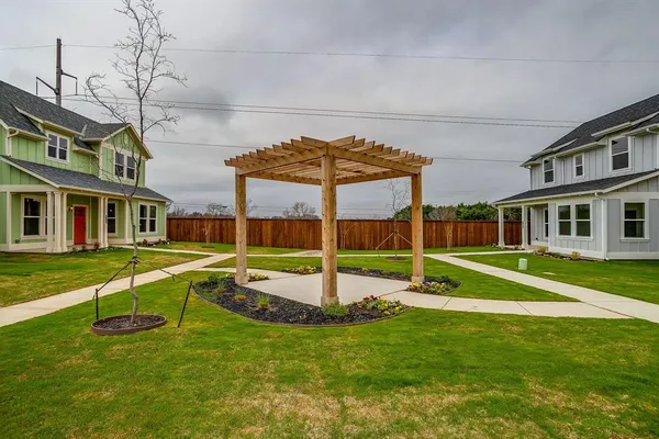 a house view with a sitting space and garden view