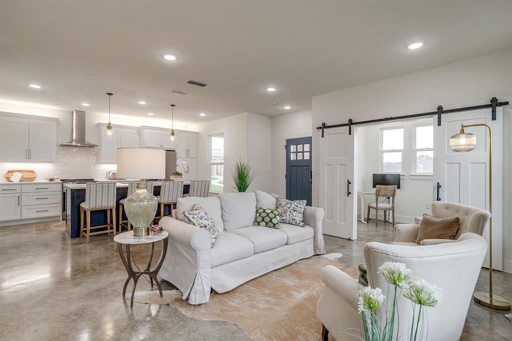 110 Cardinal Wds Granbury, TX 76049 - Photo 5 of 29 a living room with furniture and a large window