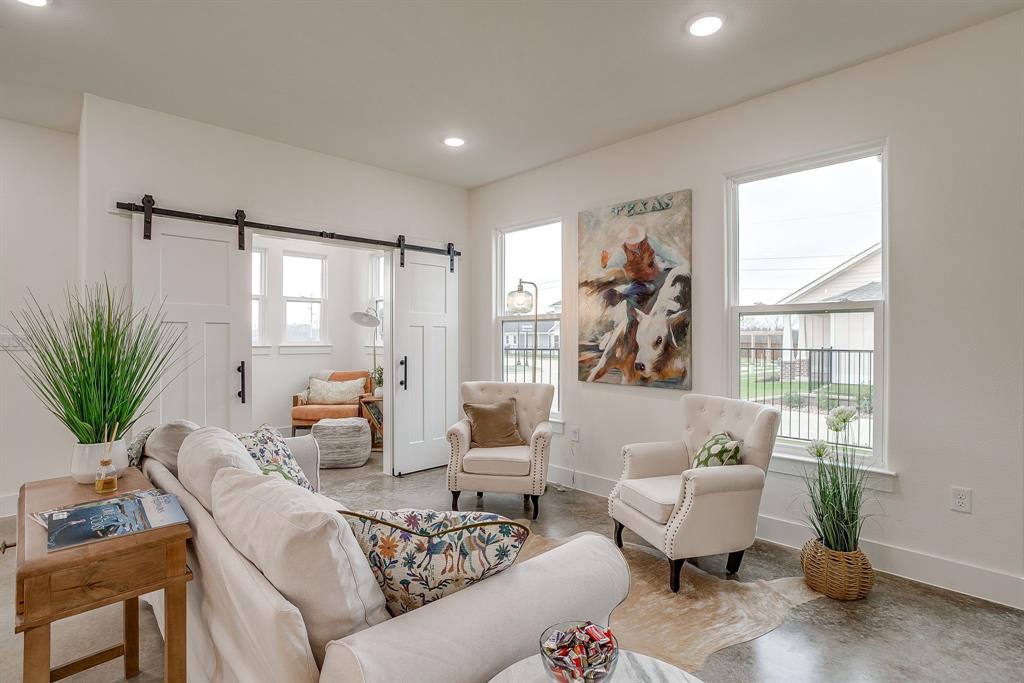 110 Cardinal Wds Granbury, TX 76049 - Photo 6 of 29 a living room with furniture and a window