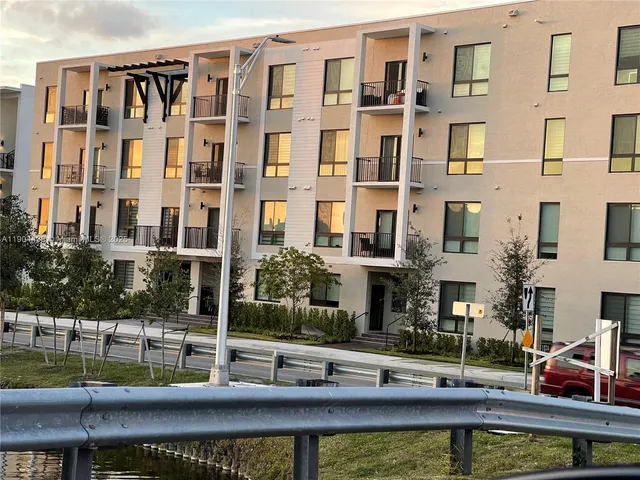 a view of a patio with swimming pool table and chairs