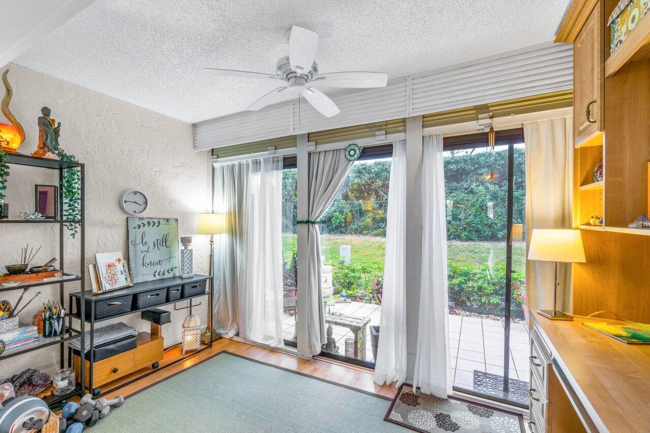 18855 Candlewick Drive Boca Raton, FL 33496 - Photo 15 of 27 a view of a room with gym equipment