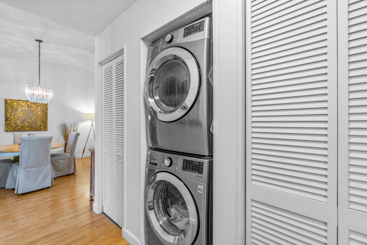 18855 Candlewick Drive Boca Raton, FL 33496 - Photo 23 of 27 a view of a livingroom with washer and dryer