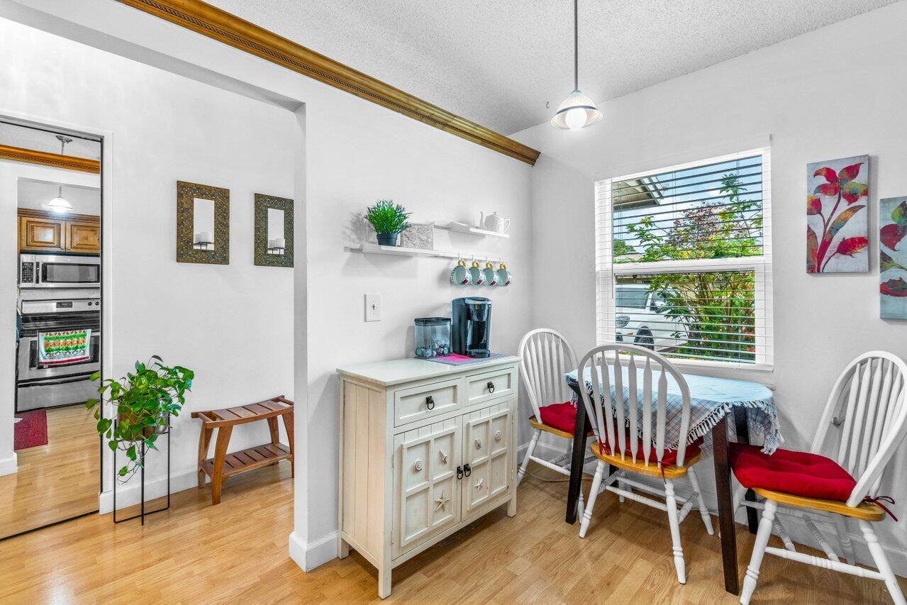 18855 Candlewick Drive Boca Raton, FL 33496 - Photo 7 of 27 a living room with furniture and a window