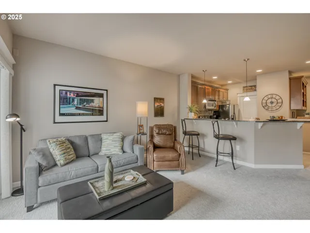 a living room with furniture and a couch