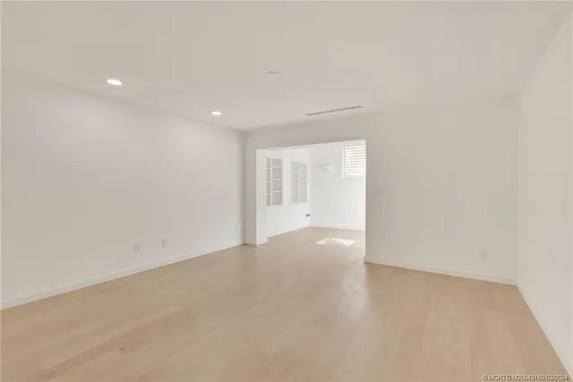 a dining area with furniture and a table