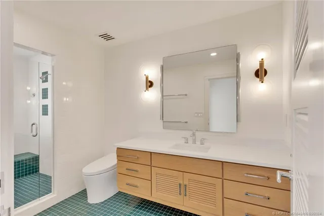 a view of swimming pool with outdoor seating and a garden