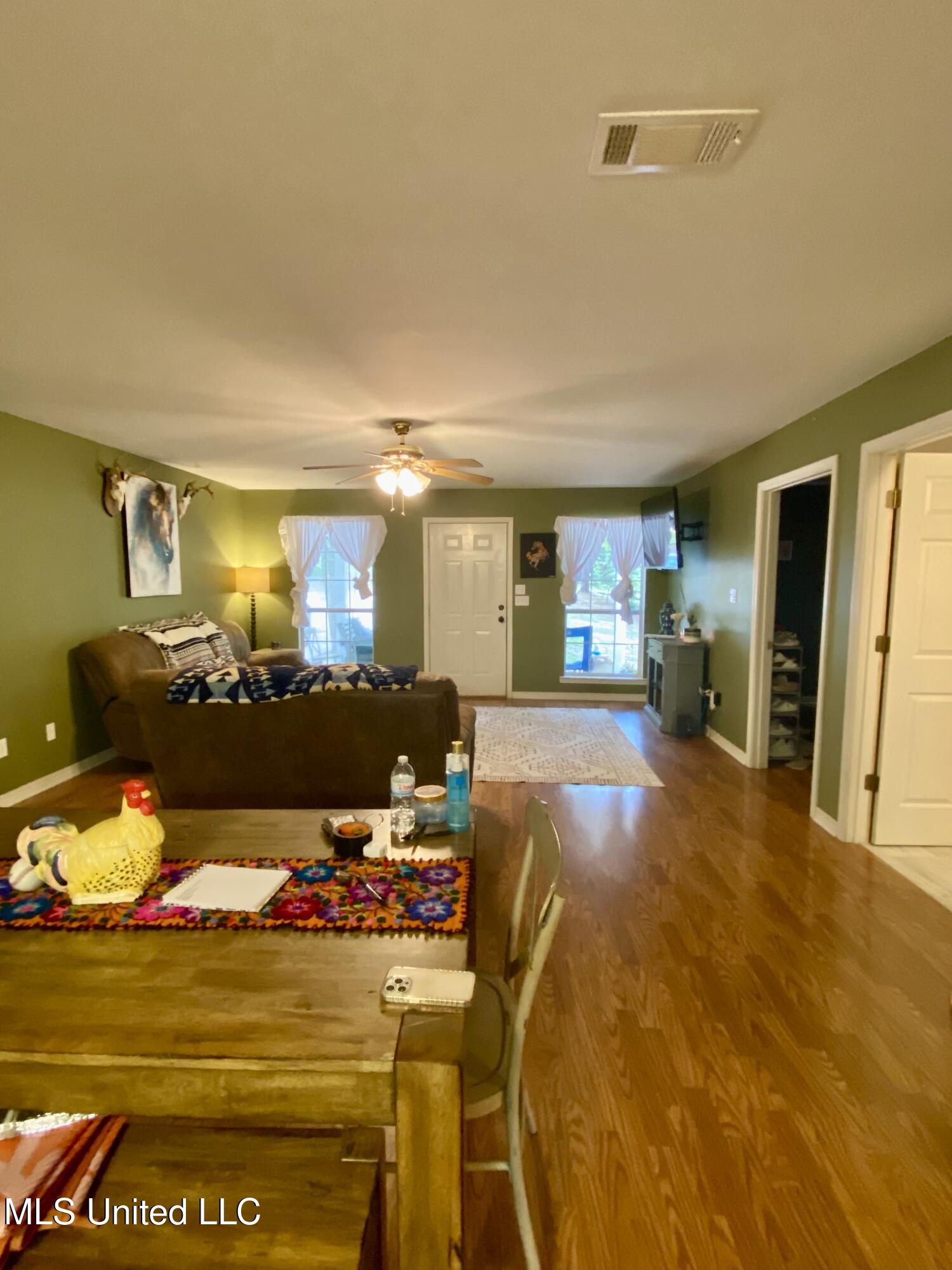 22 Uncle Pete Road Carriere, MS 39426 - Photo 7 of 17 7 Dining and living area, IMG_4496