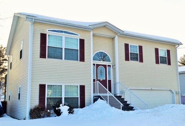 24 Curtis Street Springfield, MA 01119 - Photo 1 of 17 a front view of a house with a yard