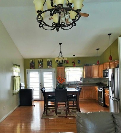 24 Curtis Street Springfield, MA 01119 - Photo 4 of 17 a view of a dining room with furniture window and wooden floor