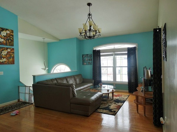 24 Curtis Street Springfield, MA 01119 - Photo 5 of 17 a living room with furniture and a window