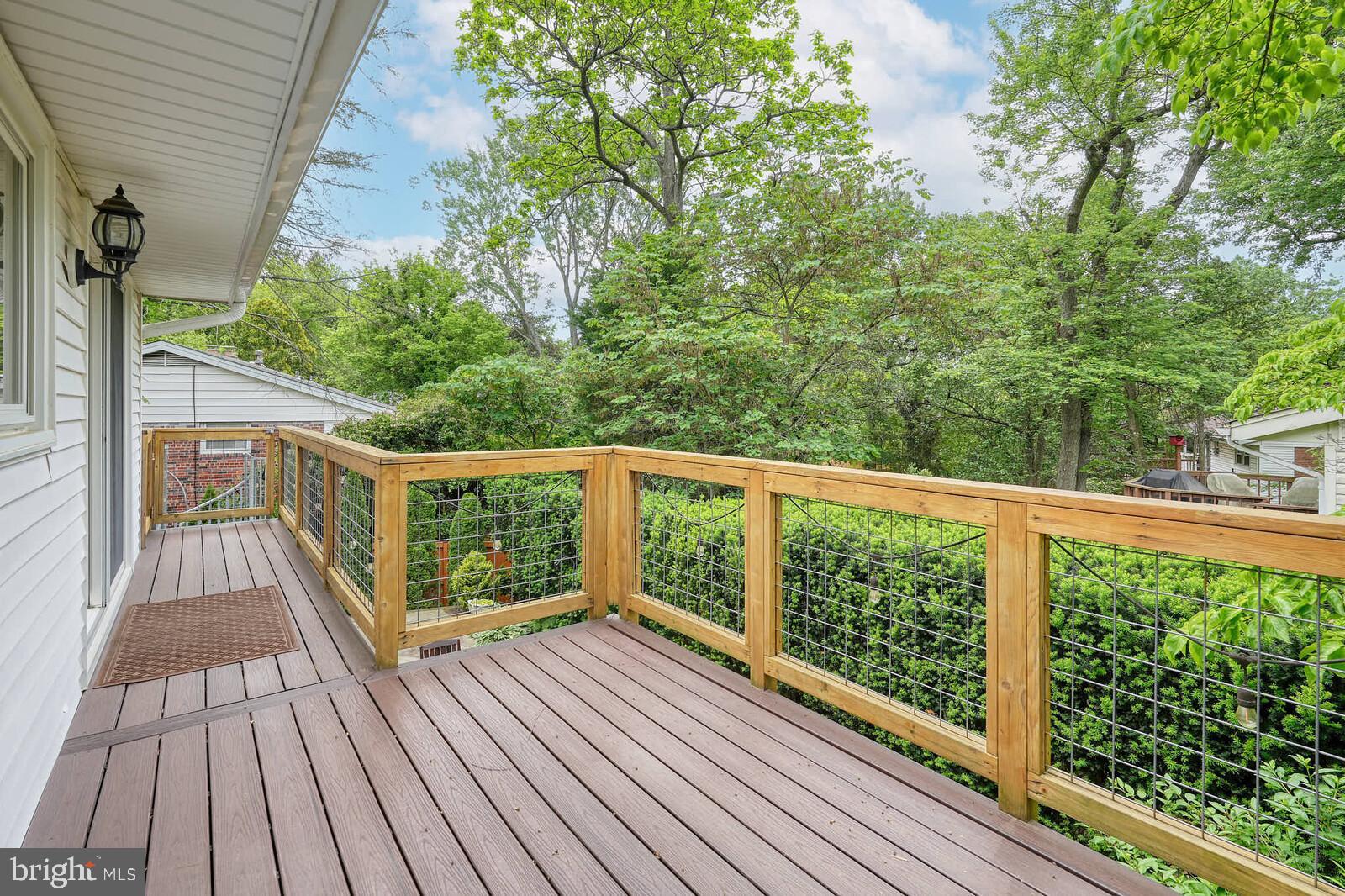 6511 Engel Drive McLean, VA 22101 - Photo 14 of 56 a view of balcony with wooden floor and fence
