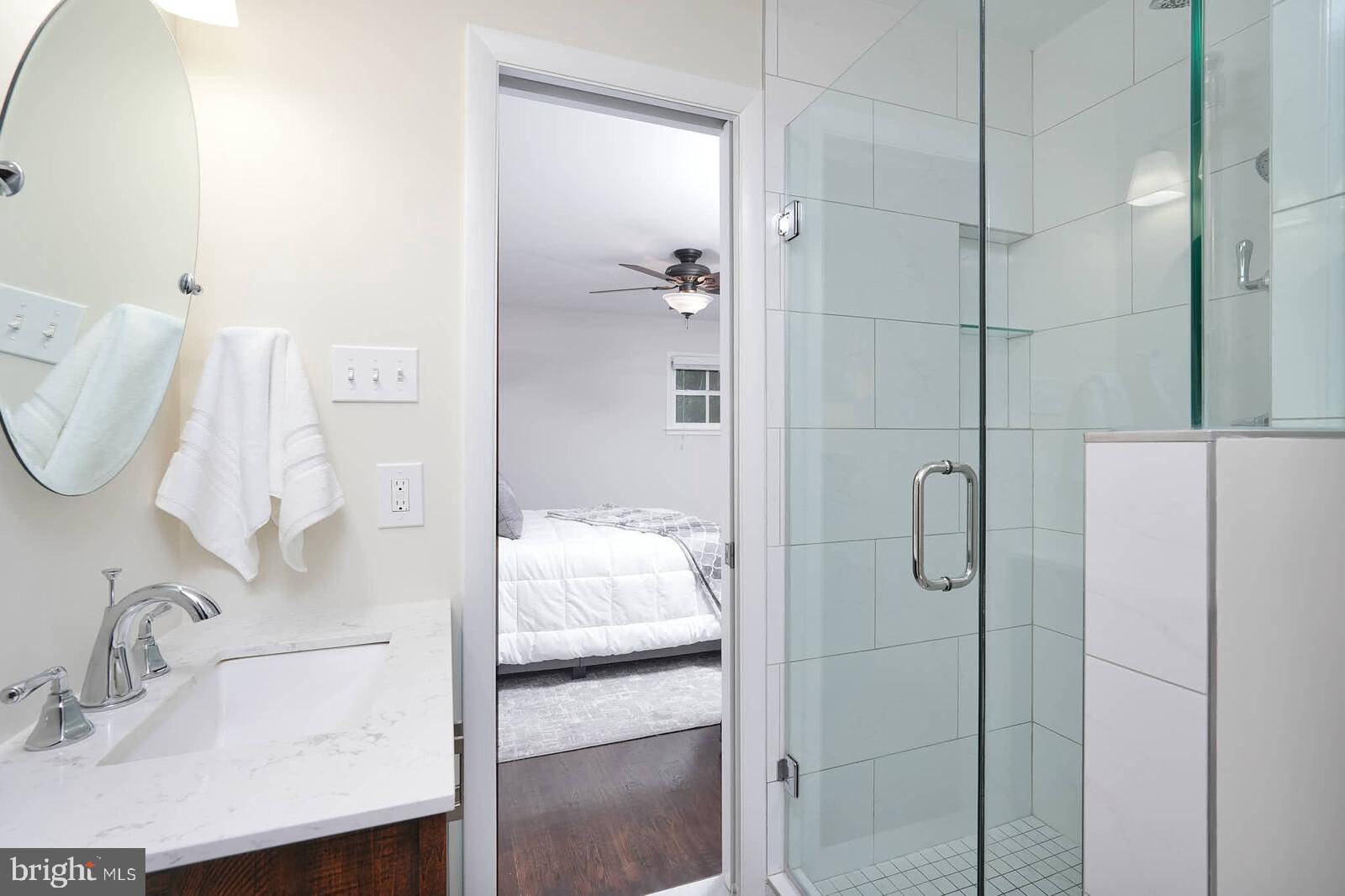 6511 Engel Drive McLean, VA 22101 - Photo 24 of 56 a bathroom with a sink and a mirror